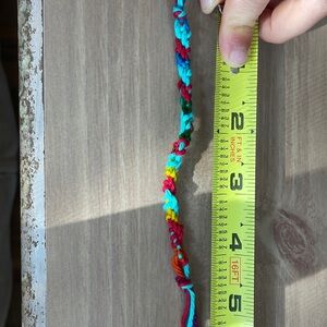 Handmade at home with yarn. Fit for kids ages 4-7 ish.